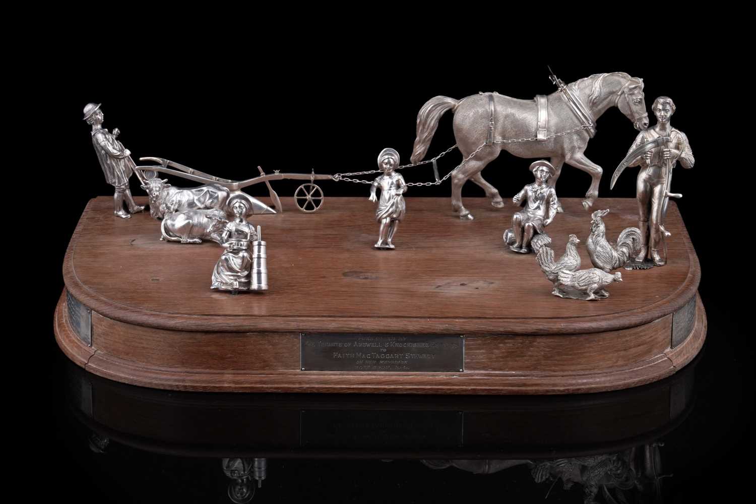 Lot 96 - A presentation group of Victorian silver peasant farm worker figures and farm animals