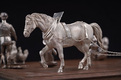 Lot 96 - A presentation group of Victorian silver peasant farm worker figures and farm animals