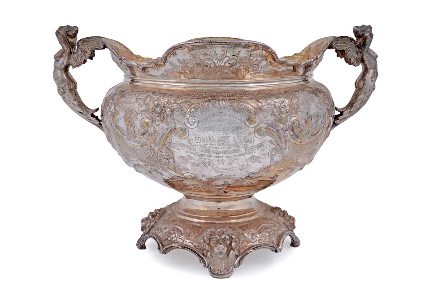 Lot 99 - An Edwardian large silver presentation cup on a domed base
