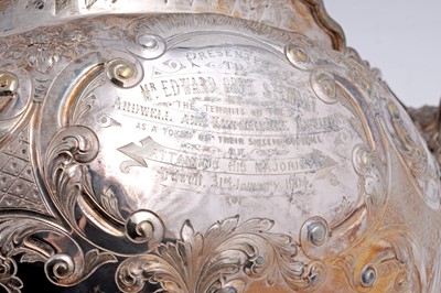 Lot 99 - An Edwardian large silver presentation cup on a domed base