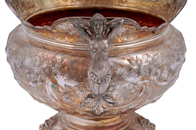 Lot 99 - An Edwardian large silver presentation cup on a domed base
