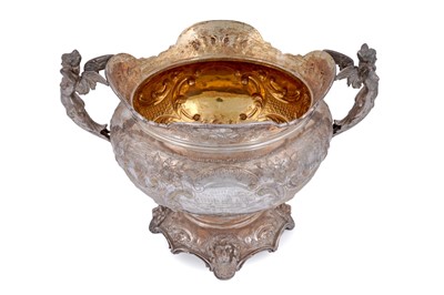 Lot 99 - An Edwardian large silver presentation cup on a domed base