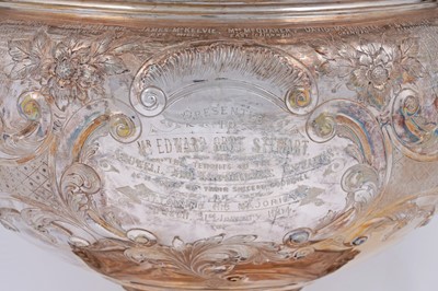 Lot 99 - An Edwardian large silver presentation cup on a domed base