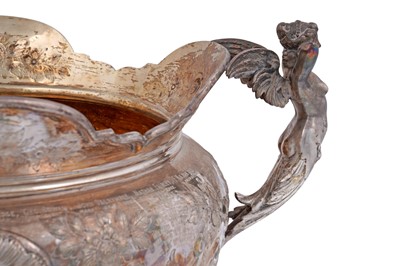 Lot 99 - An Edwardian large silver presentation cup on a domed base