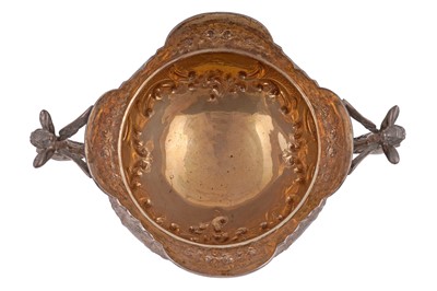 Lot 99 - An Edwardian large silver presentation cup on a domed base
