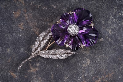 Lot 525 - A late Victorian carved amethyst and diamond pansy brooch