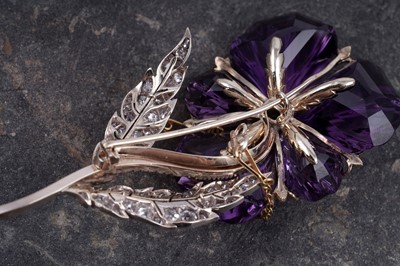 Lot 525 - A late Victorian carved amethyst and diamond pansy brooch