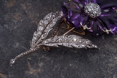 Lot 525 - A late Victorian carved amethyst and diamond pansy brooch