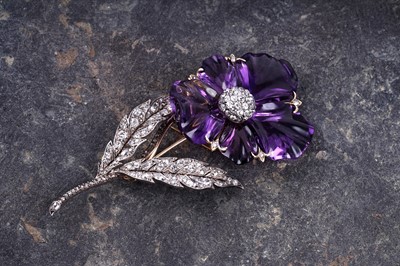 Lot 525 - A late Victorian carved amethyst and diamond pansy brooch