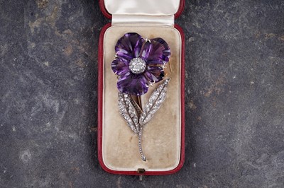Lot 525 - A late Victorian carved amethyst and diamond pansy brooch