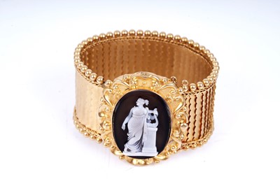 Lot 526 - A fine Victorian hardstone cameo and gold cuff bracelet