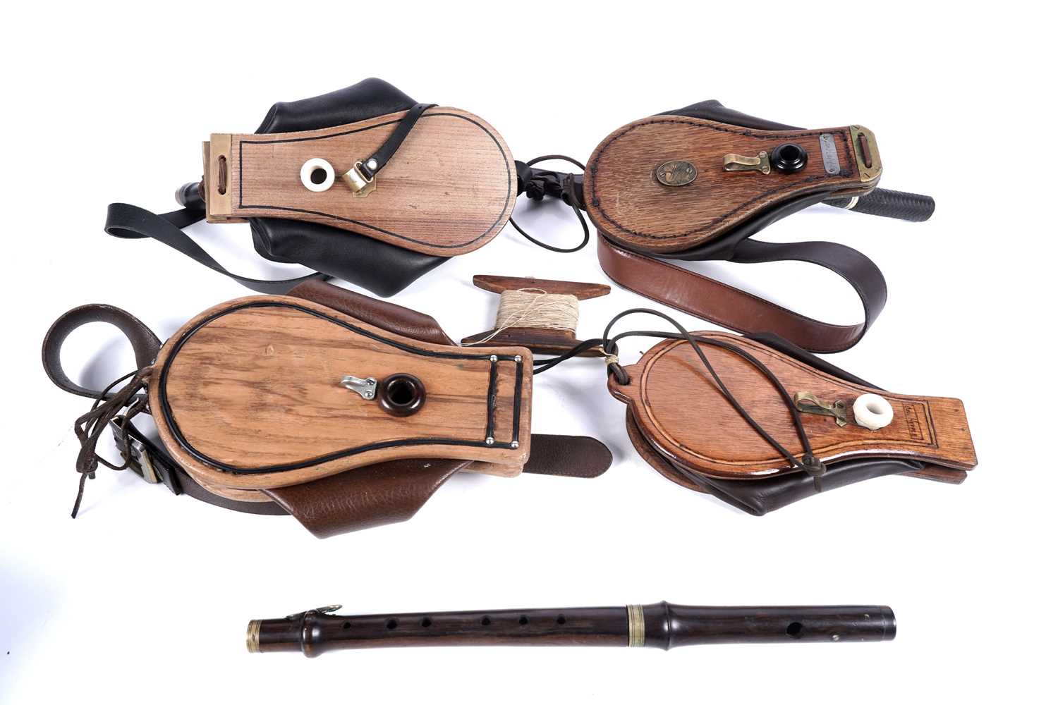 Lot 38 - Four sets of bellows; and a flute