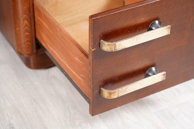Lot 90 - A mid-Century oak pedestal desk