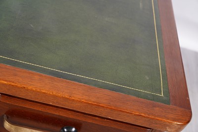 Lot 90 - A mid-Century oak pedestal desk