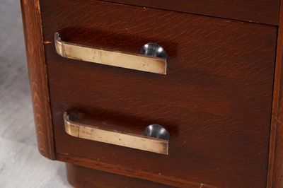 Lot 90 - A mid-Century oak pedestal desk