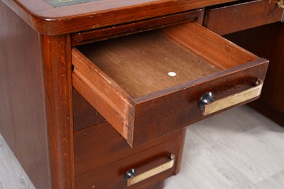 Lot 90 - A mid-Century oak pedestal desk