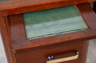 Lot 90 - A mid-Century oak pedestal desk