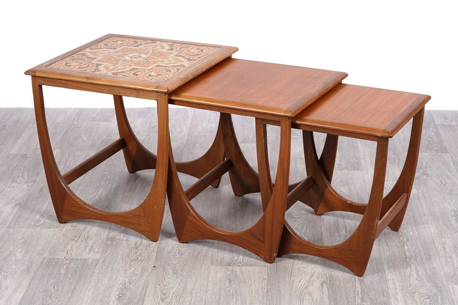 Lot 112 - G-Plan: a teak nest of three 'Astro' tables
