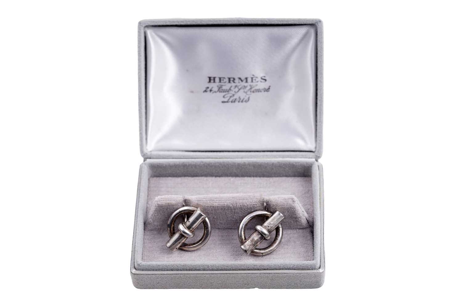 Lot 38 - A pair of Hermès silver cufflinks