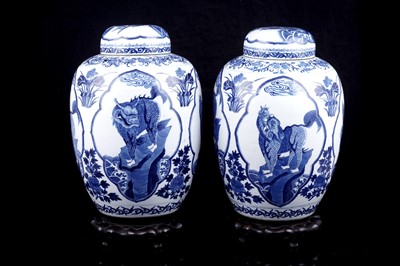 Lot Pair of Chinese mythical beast jars and covers