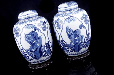 Lot Pair of Chinese mythical beast jars and covers