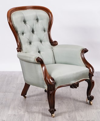 Lot 28 - A Victorian walnut framed armchair