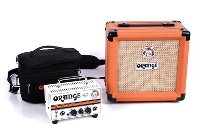 Lot 347 - An Orange MicroTerror and cabinet