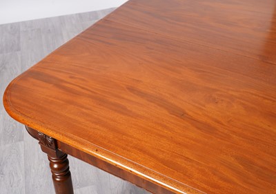 Lot 21 - A late Georgian mahogany dining table