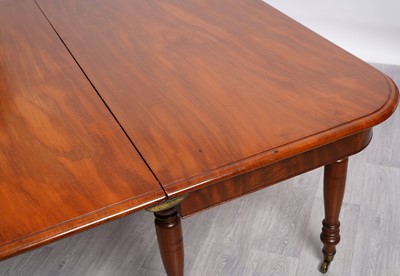Lot 21 - A late Georgian mahogany dining table
