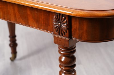 Lot 21 - A late Georgian mahogany dining table