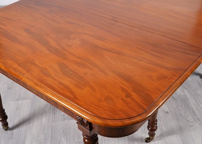 Lot 21 - A late Georgian mahogany dining table