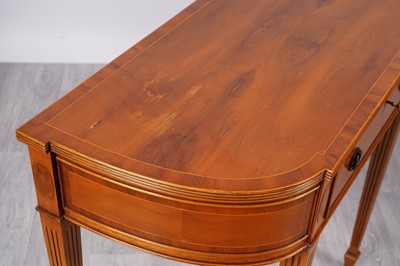 Lot 30 - A pair of reproduction Regency breakfront side tables