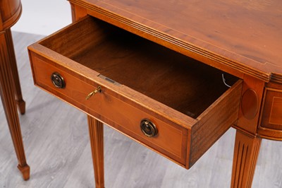 Lot 30 - A pair of reproduction Regency breakfront side tables