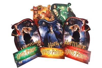 Lot 343 - Harry Potter and The Chamber of Secrets decorations; and four Philosopher's Stone posters