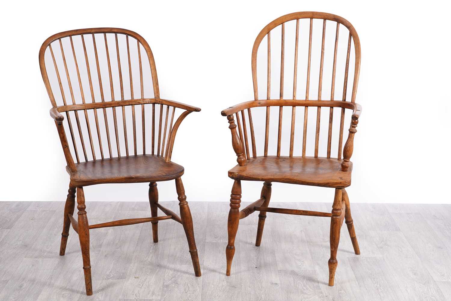 Lot 50 - A 19th Century Windsor armchair; and another of elm wood construction