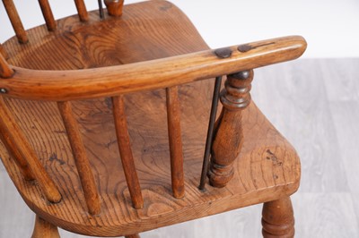 Lot 50 - A 19th Century Windsor armchair; and another of elm wood construction
