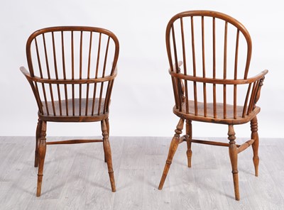 Lot 50 - A 19th Century Windsor armchair; and another of elm wood construction