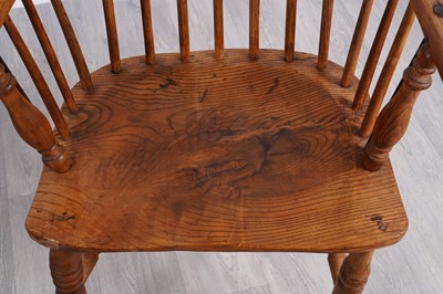 Lot 50 - A 19th Century Windsor armchair; and another of elm wood construction