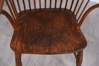 Lot 50 - A 19th Century Windsor armchair; and another of elm wood construction