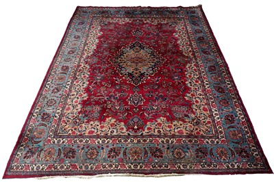 Lot 111 - A mid-20th Century hand-woven Kashan style carpet