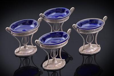 Lot 105 - A set of four George III silver pedestal salts