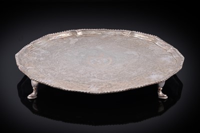Lot 106 - A George III silver salver of shaped circular outline