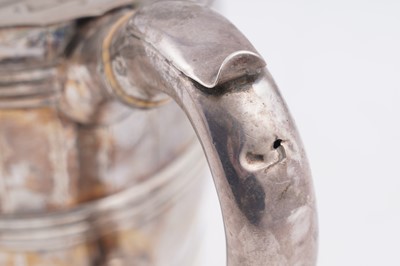 Lot 107 - A George III silver teapot; and an early Victorian silver teapot