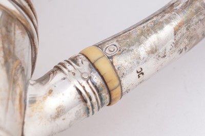 Lot 107 - A George III silver teapot; and an early Victorian silver teapot