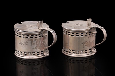 Lot 114 - A pair of late Victorian silver mustard pots