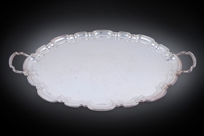 Lot 7 - An Elizabeth II silver two-handled tea tray of shaped oval outline