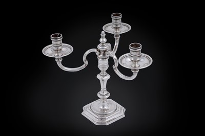 Lot 8 - An Elizabeth II cast silver three-light candelabrum