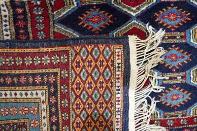 Lot 166 - Two mid-20th Century Pakistani Bokara-style rugs