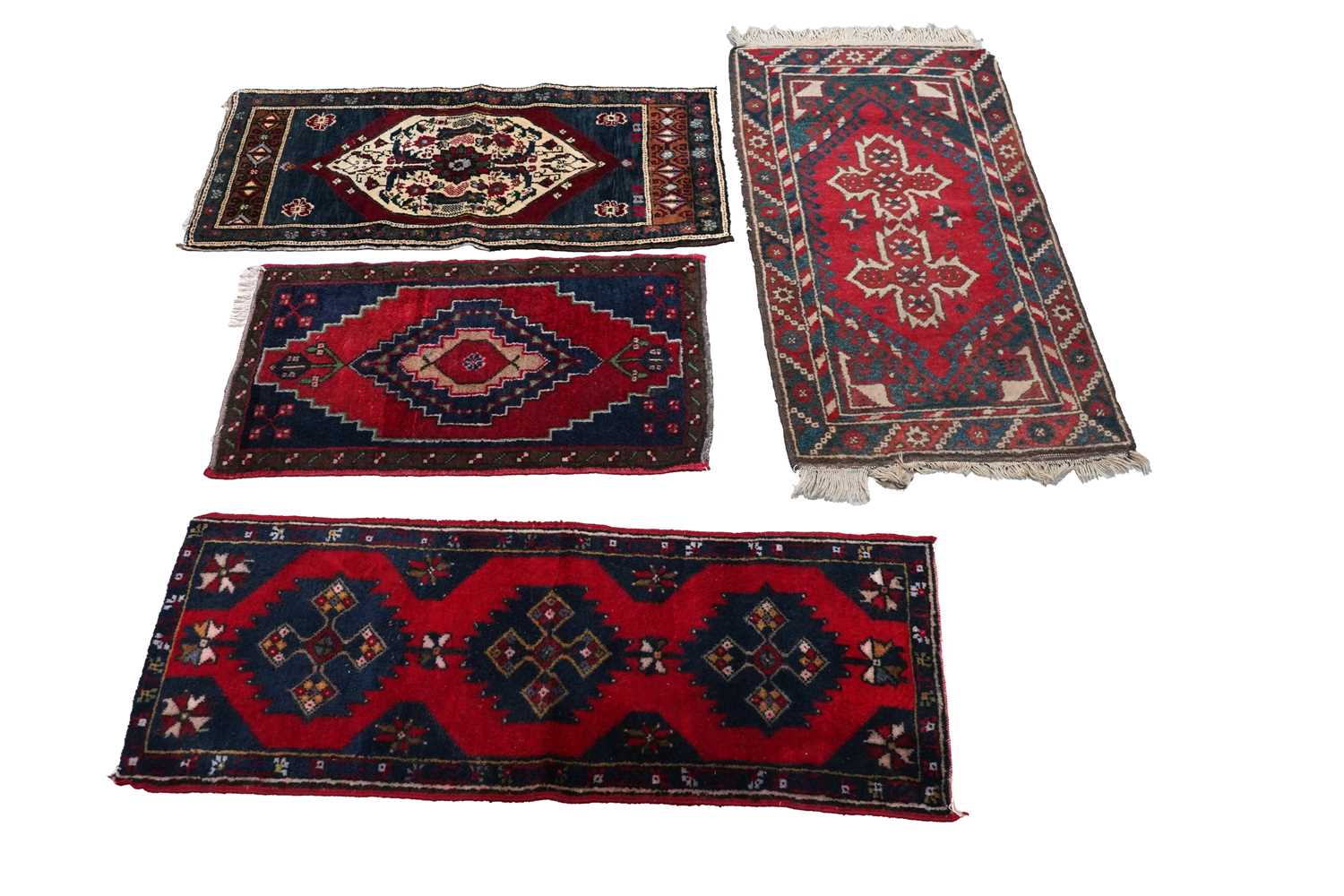 Lot 147 - A collection of hand-woven Turkish woollen prayer mats and a runner