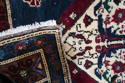Lot 147 - A collection of hand-woven Turkish woollen prayer mats and a runner